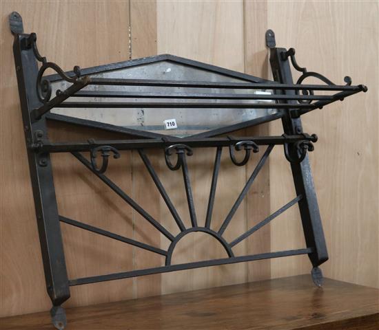 A wrought iron wall mounting hat and coat rack W.80cm